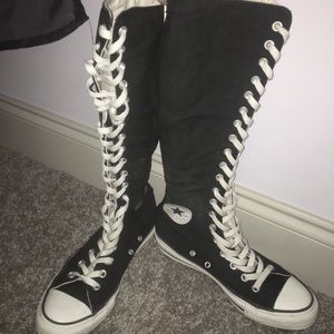 Knee-high black converse boots